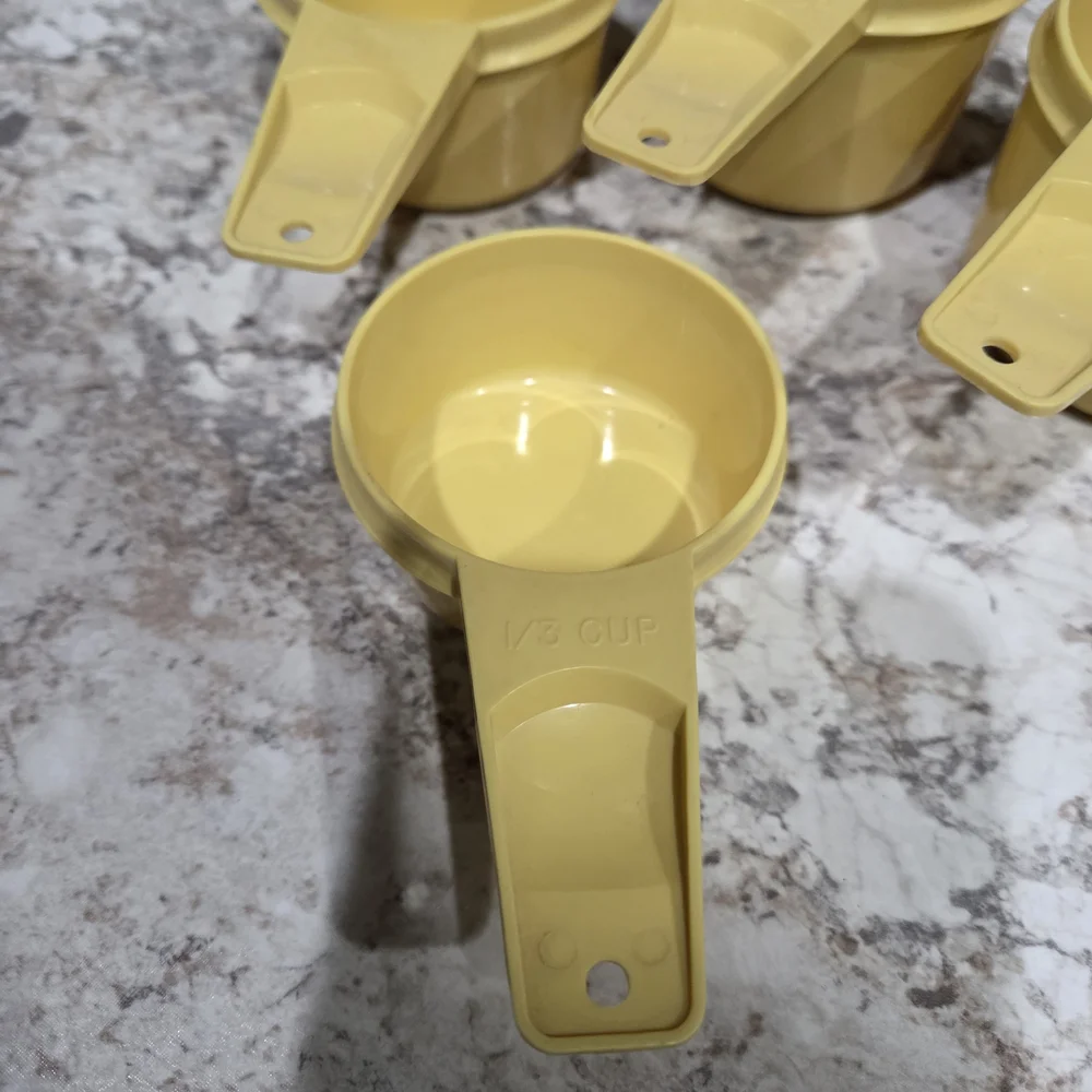 Vintage Tupperware Yellow Measuring Cups Set 1/4c, 1/3c, 1/2c, And 3/4c.